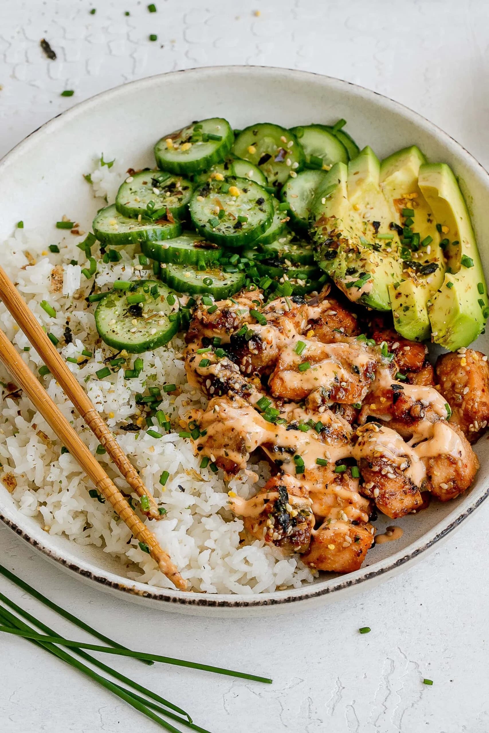 Spicy Salmon Bowls with Coconut Rice and Quick-Pickled Cucumber