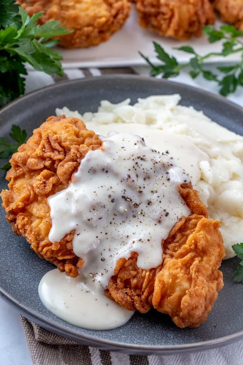 Chicken Fried Chicken with Crisp Golden Coating and Country Gravy
