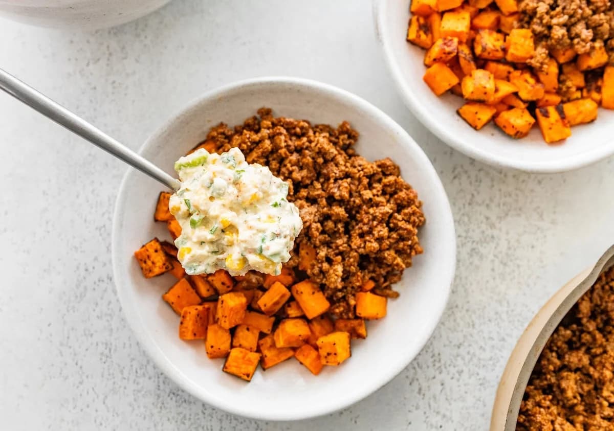 Mexican Street Corn Sweet Potato Beef Bowl with Creamy Corn Topping