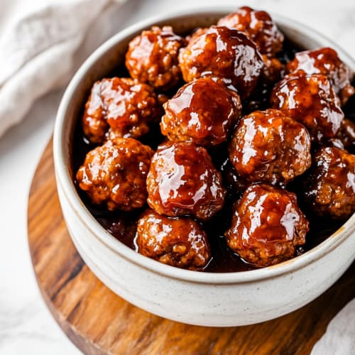 Crockpot Sweet Chili Meatballs with Grape Jelly and Pineapple