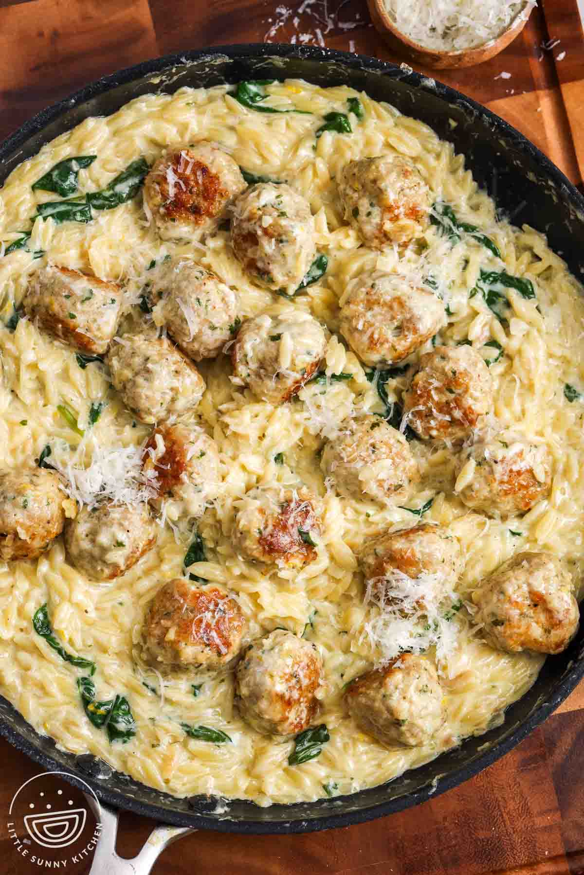 One Pan Lemon Chicken Meatballs and Orzo with Creamy Parmesan Spinach